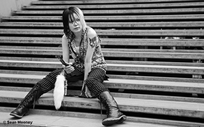 Street photo of young Japanese woman