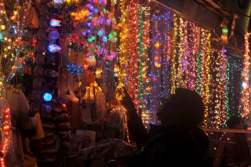 Man shopping for Diwali electric lights